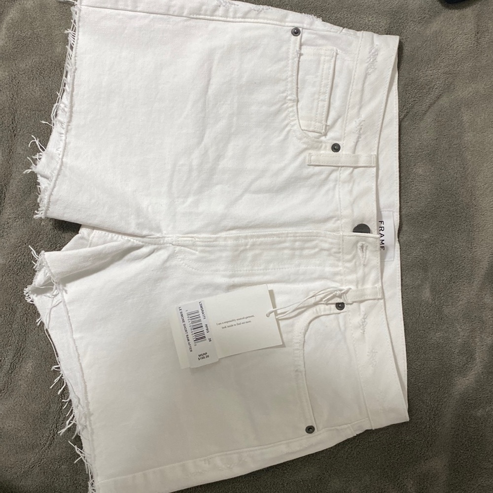 Frame Denim White ripped jean shorts